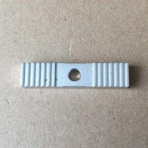 Toothed clamp for open ended belt